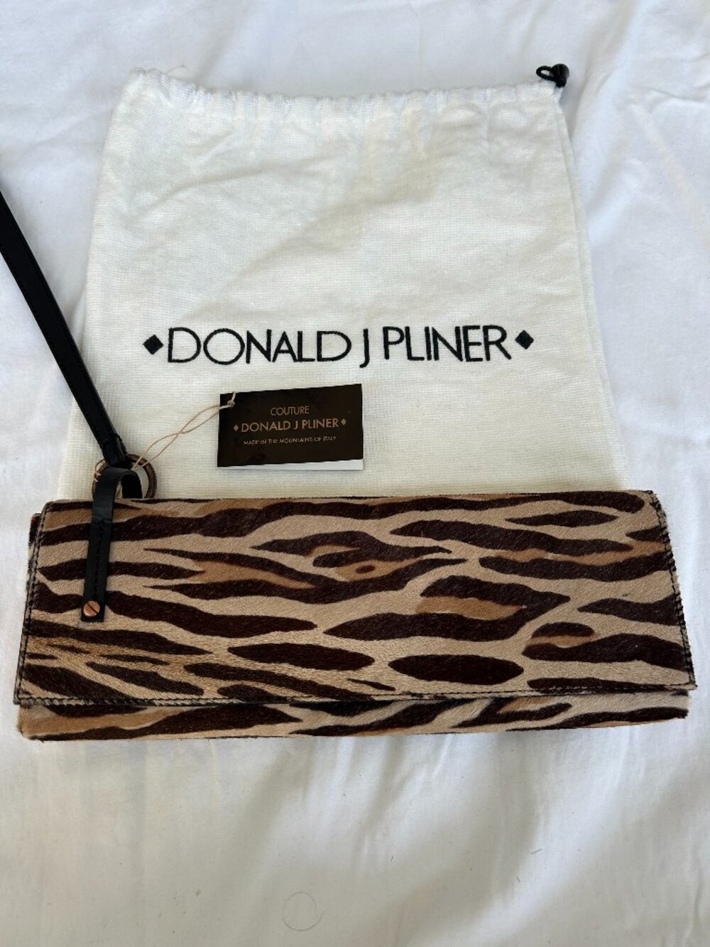 Donald J Pliner Couture Animal Print haircalf clutch with wrist strap